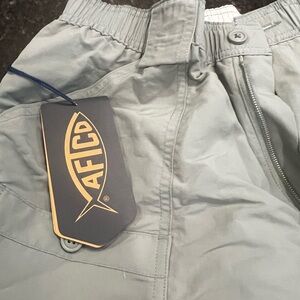 New with tags  AFTCO- original fishing shorts. Color - cactus.